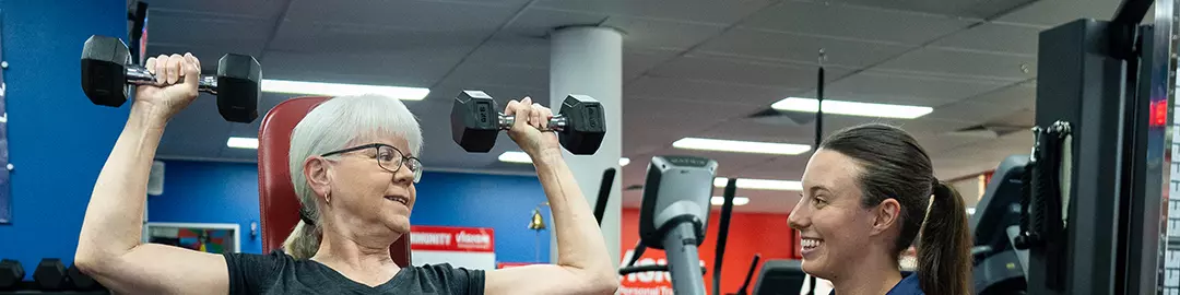 female shoulder press vision personal training 