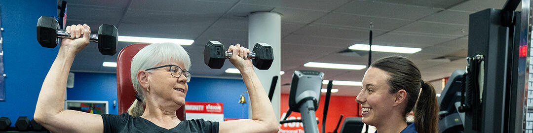 female shoulder press vision personal training 