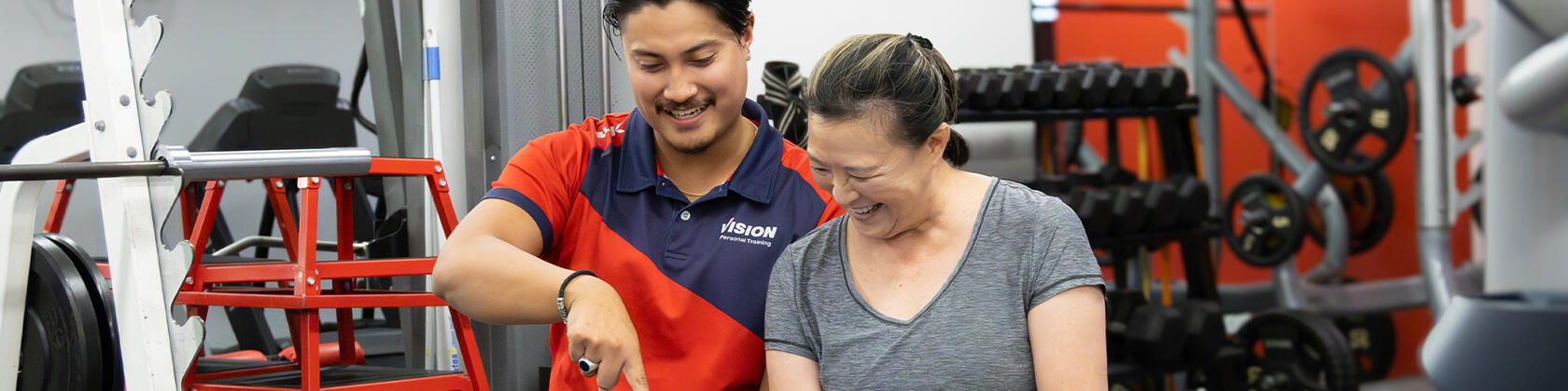 Client and trainer discussing training plan