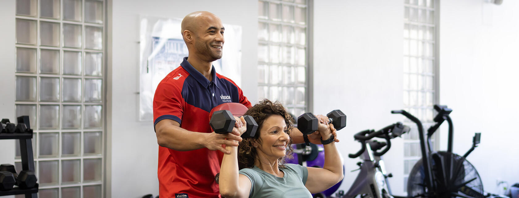 Male trainer with female client