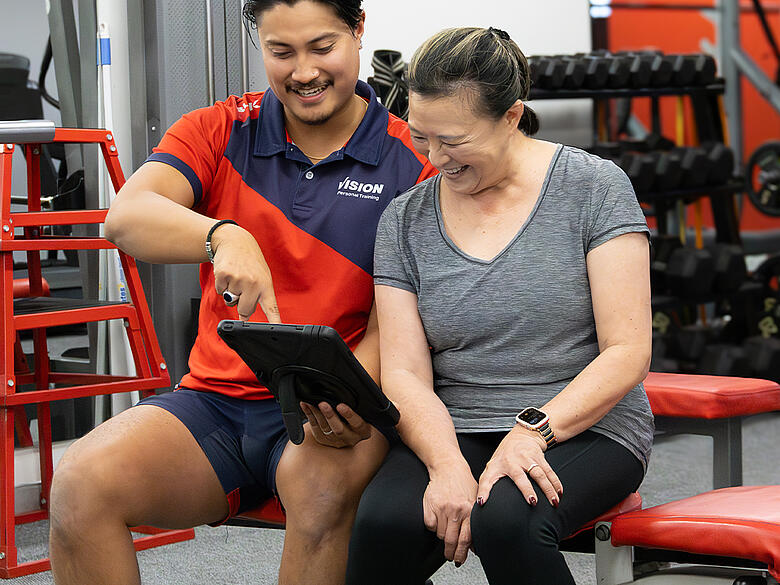 Client and trainer discussing training plan