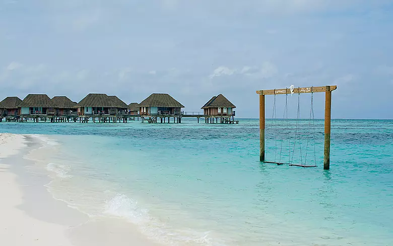 Swing and huts on water mobile