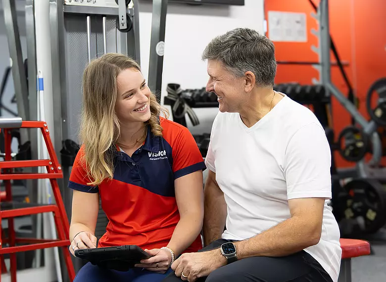Female trainer with male client