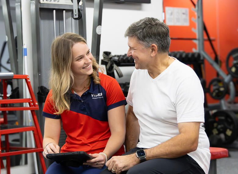 Female trainer with male client