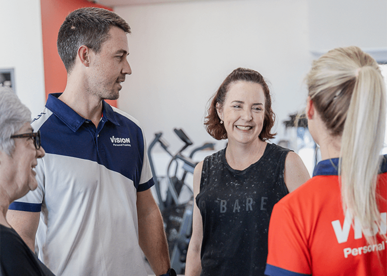 2 female clients with male and female trainer