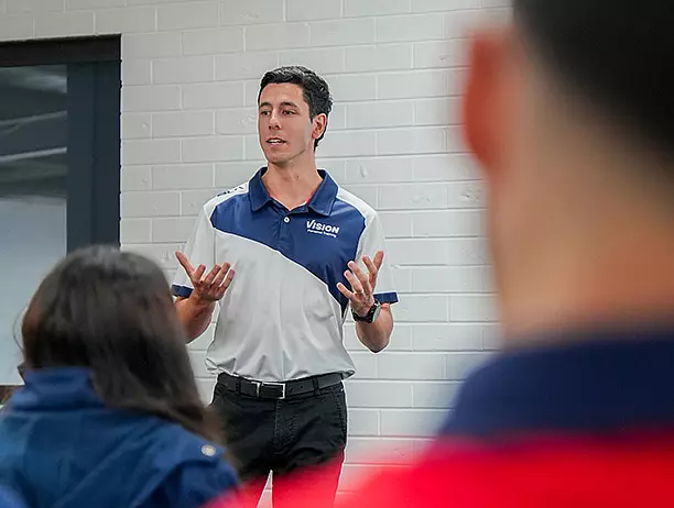 Male trainer in classroom setting