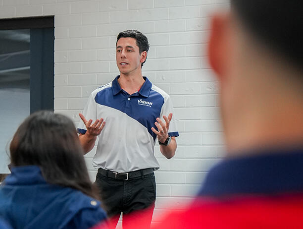Male trainer in classroom setting